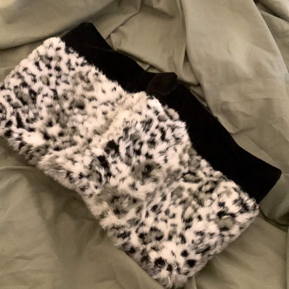 Faux fur winter scarf/hand warmer. Stored in gift box for about a year.